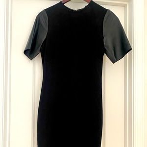 Vince knee length sheath dress with leather short sleeves. Worn twice